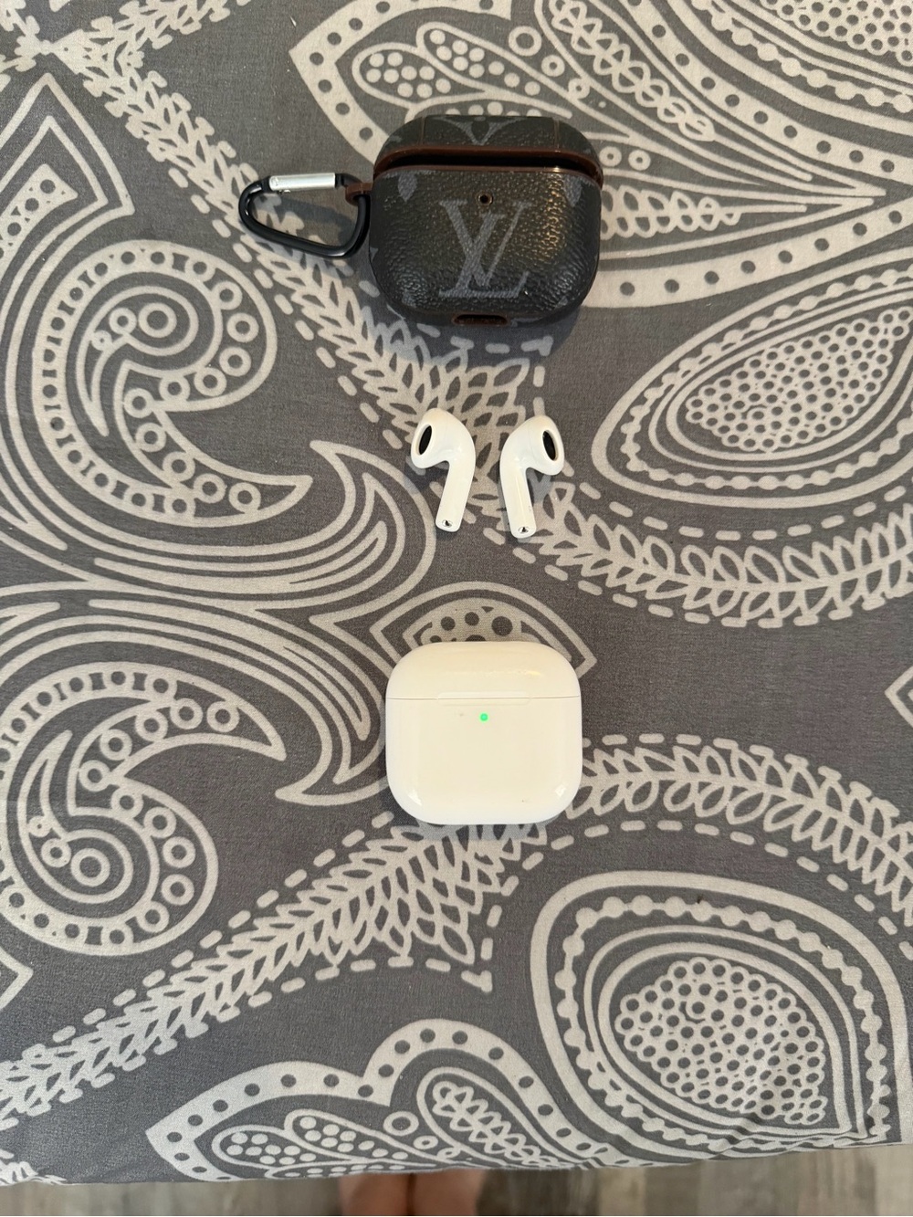 Louis Vuitton Brown Monogram AirPods Case with White Earbuds